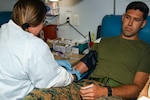 Service members and Department of Defense civilian employees donate blood in a blood drive outside Naval Medical Center Camp Lejeune on Sept. 8, 2023.The Armed Services Blood Program at NMCCL hosts monthly blood drives at locations across Marine Corps Installations East to increase the store of blood units that are utilized for care of active-duty military, their families, and retirees.