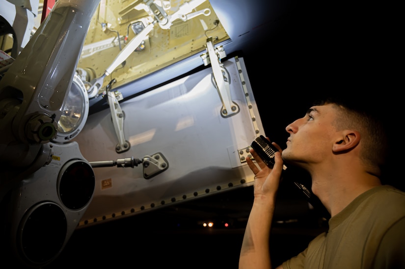 U.S. Air Force Senior Airman Lane Hilderbrand, 605th Aircraft Maintenance Squadron flying crew chief, performs a pre-launch inspection for the KC-46A Pegasus during the Neptune Series at Travis Air Force Base, Calif., Oct. 23, 2023. This joint air interoperability exercise is the first-ever certification event for the KC-46A Pegasus tankers assigned to Joint Base McGuire-Dix-Lakehurst, N.J. (U.S. Air Force photo by Airman 1st Class Simonne Barker)