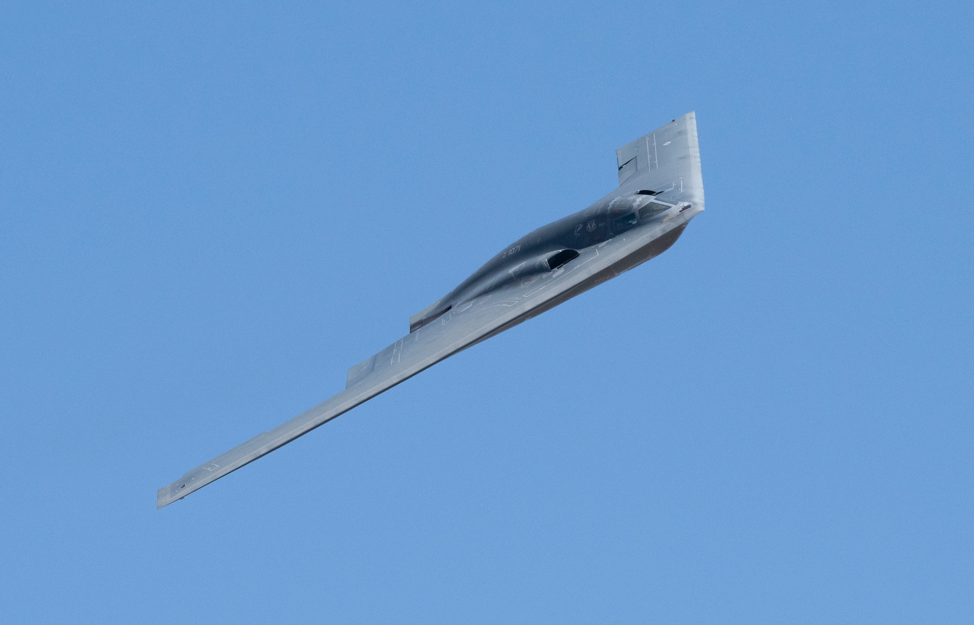 A U.S. Air Force B-2 Spirit performs a fly-by during Wings Over Solano at Travis Air Force Base, California, May 14, 2022. The two-day event featured performances by the Wings of Blue parachute team, Team Travis Parade of Heavies, F-16 Fighting Falcon and F-35A Lightning II Demonstration Teams, as well as static displays. (U.S. Air Force photo by Heide Couch)