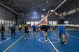 Members of the Pennsylvania Air National Guard's 111th Attack Wing play volleyball during the 111th ATKW Commander's Cup at Biddle Air National Guard Base in Horsham, Pennsylvania, Oct. 14, 2023. The Commander's Cup, which consisted of tug of war, a sprint medley, pull ups, volleyball, basketball, corn hole and weightlifting, is an event designed to promote camaraderie while highlighting resilience and physical fitness. (U.S. Air National Guard Photo by Tech Sgt. Zach Vucic)