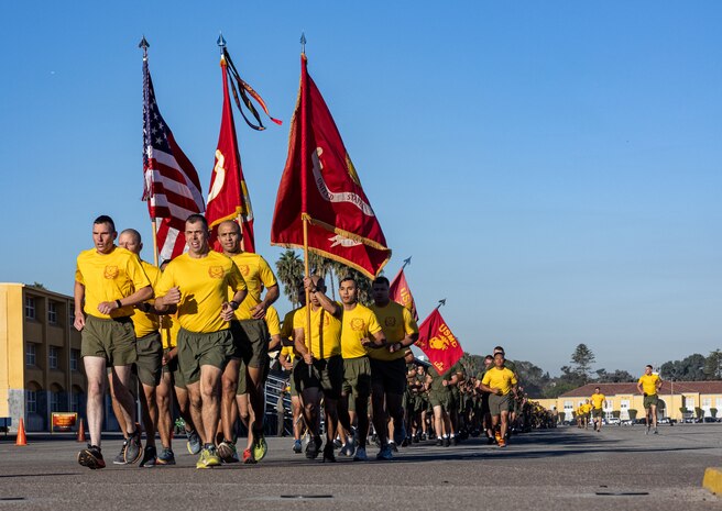 U.S. Marines with Hotel Company, 2nd Recruit Training Battalion, run in formation during the motivational run on Marine Corps Recruit Depot San Diego, Nov 2, 2023. The motivational run signifies the last physical fitness event conducted in recruit training (U.S. Marine Corps photo by Sgt Jesse K. Carter-Powell)
