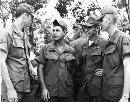Airmen talking in Vietnam