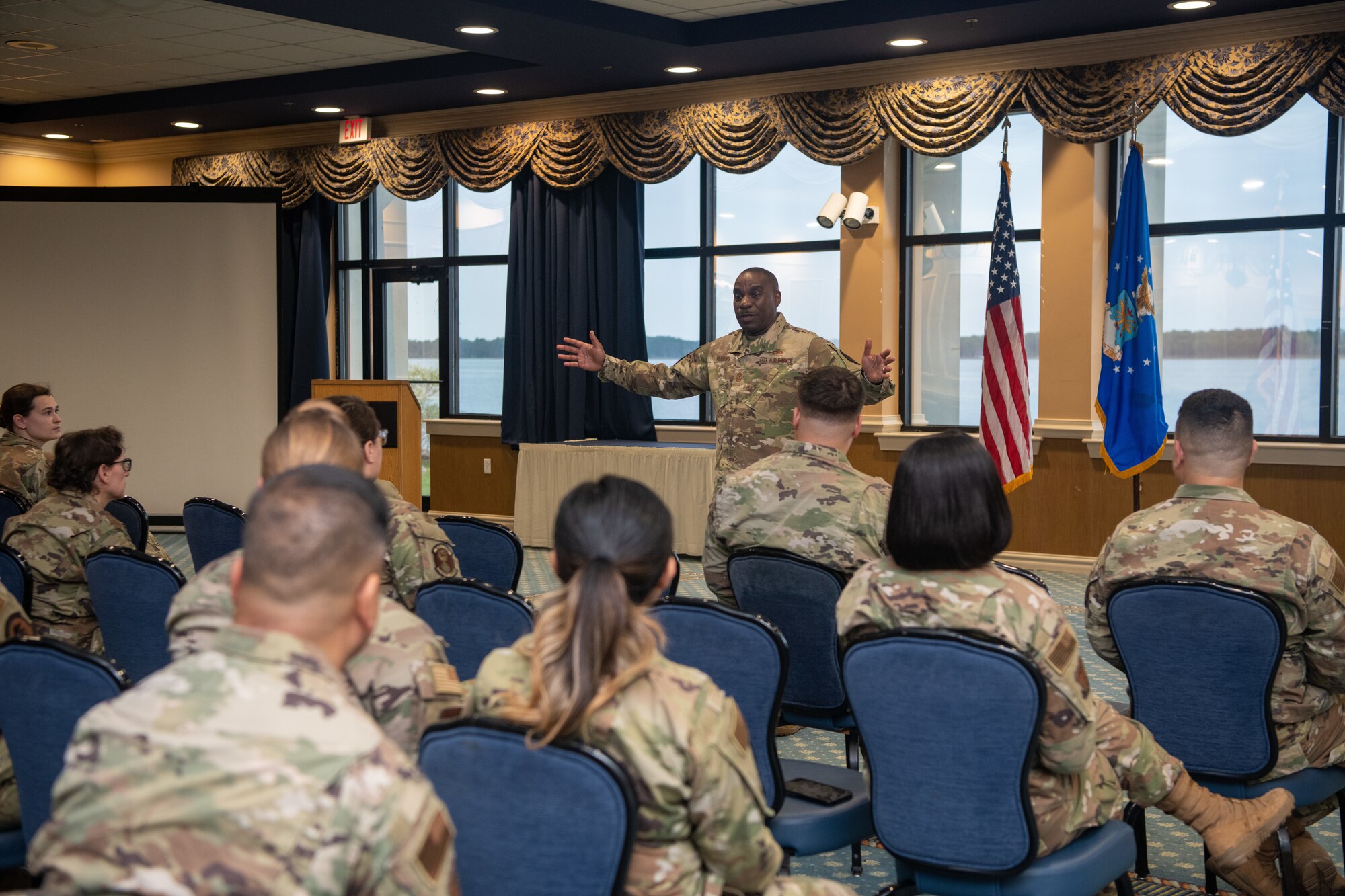 U.S. Air Force Chief Master Sergeant Maurice L. Williams, center, command chief, Air National Guard, speaks to junior enlisted members of the Virginia Air National Guard during a visit to the 192nd Wing Oct. 14, 2023, at Joint Base Langley-Eustis, Virginia. Williams emphasized to the Airmen the importance of mission and vision statements, having one-on-one briefs with new members, and communicating to all junior enlisted ranks. (U.S. Air National Guard photo by Staff Sgt. Kellyann Elish)