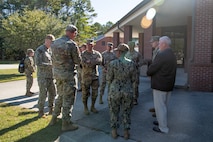 U.S. Air Force Maj. Gen. John Klein, U.S. Air Force Expeditionary Center commander, meets with service members at the Naval Weapons Station, Goose Creek, South Carolina, Nov. 2, 2023.