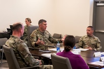U.S. Air Force Maj. Gen. John Klein, U.S. Air Force Expeditionary Center commander, and Chief Master Sgt. Courtney Freeman, USAFEC command chief meet with Joint Base Charleston leaders during his visit to the Naval Weapons Station, Goose Creek, South Carolina, Nov. 2, 2023.
