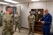 U.S. Air Force Maj. Gen. John Klein, U.S. Air Force Expeditionary Center commander, listens to mental health providers at the 628th Medical Group, during a visit to Joint Base Charleston, South Carolina, Nov. 2, 2023.
