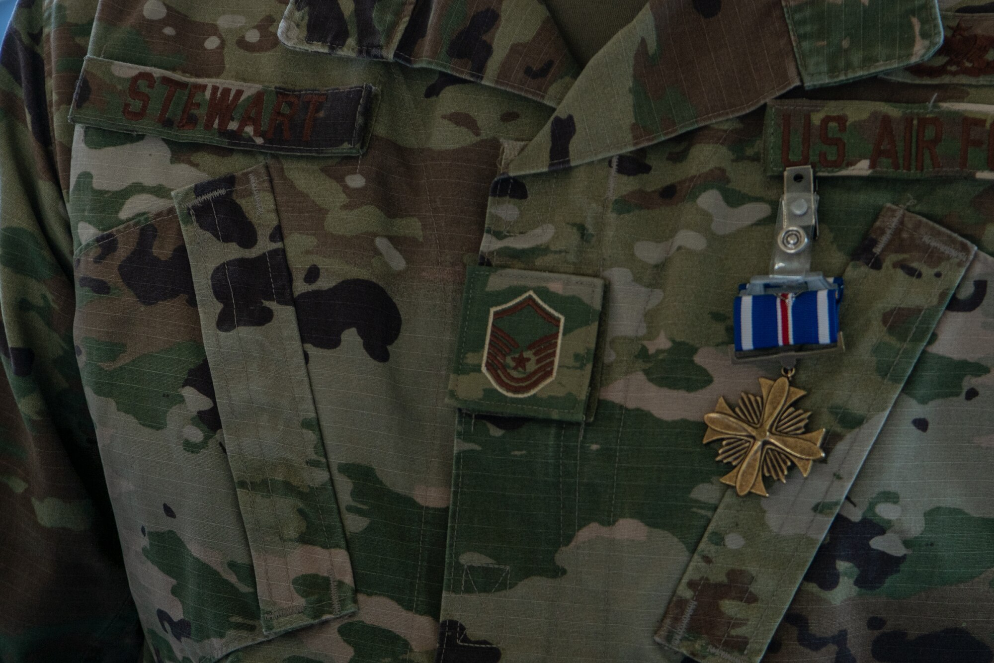 Two members of the Air Force Reserve's 315th Airlift Wing were presented the Distinguished Flying Cross during a ceremony held here November 5, 2023. Master Sgt. Josh Lewis and Master Sgt. Adam Stewart, Flying Crew Chiefs with the 315th Aircraft Maintenance Squadron, received the Distinguished Flying Cross for their efforts as part of Operation Allies Refuge in 2021, during which they helped firsthand to evacuate hundreds of civilians via air from Kabul, Afghanistan, to include a baby born while in flight. 
(U.S. Air Force photo by Master Sgt. Jeffrey Fitzmorris)