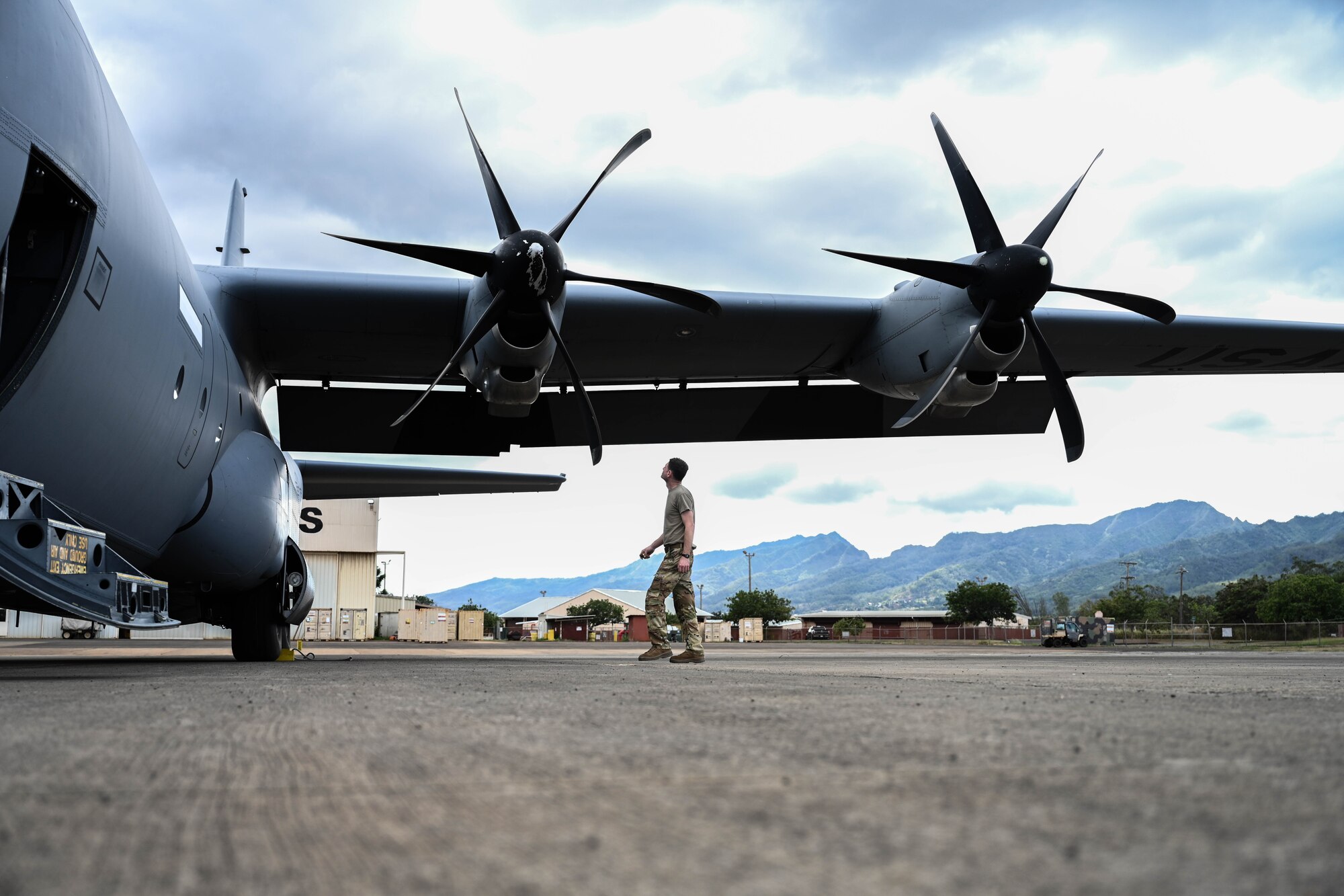 An Airman walks on the flightline.