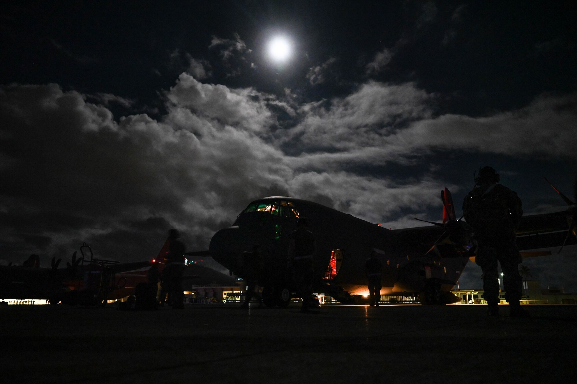 An aircraft sits on the flightline.