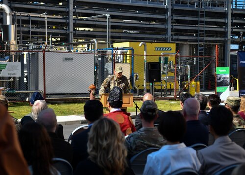 Commander address crowd at ribbon-cutting ceremony.
