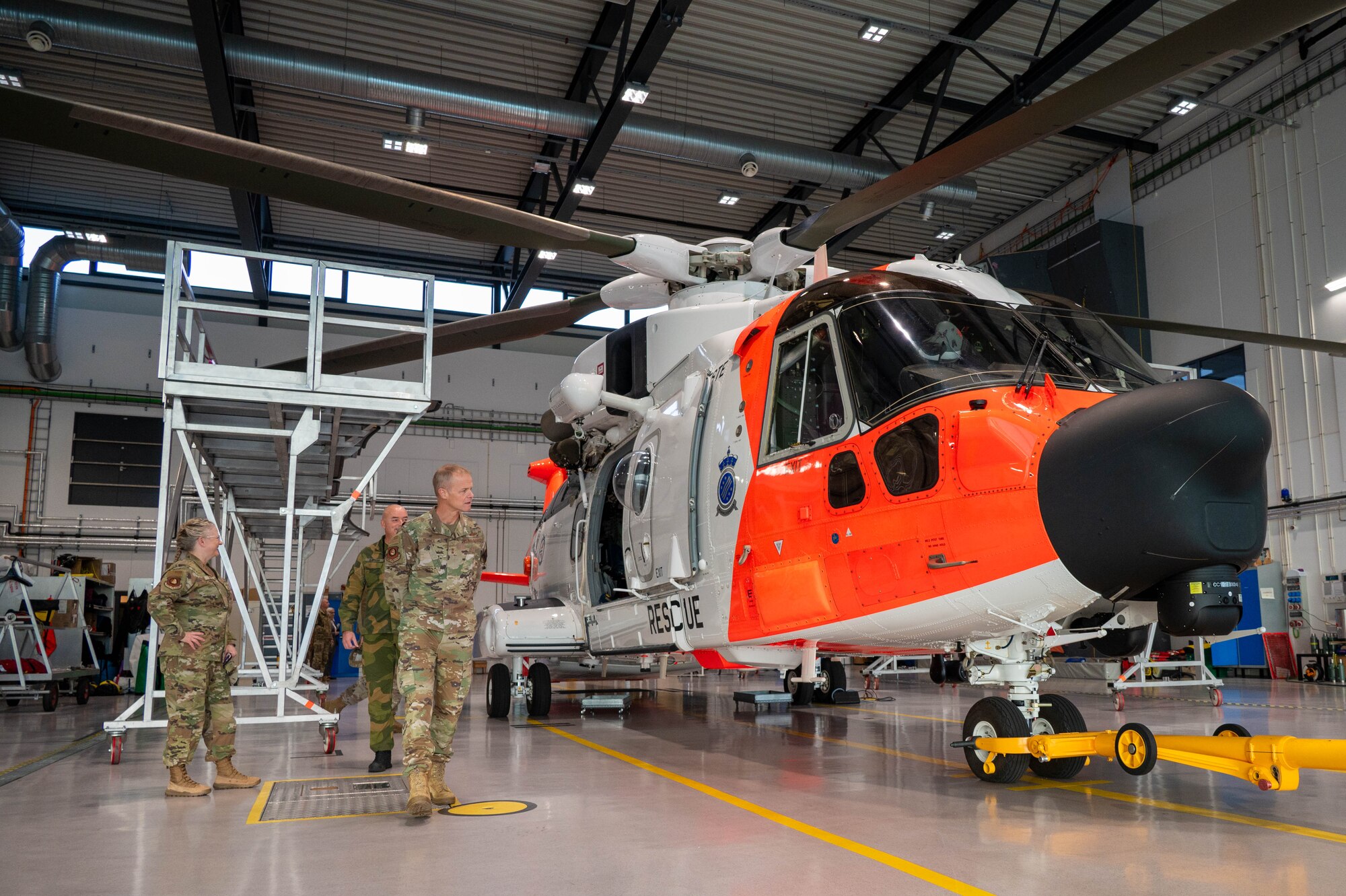 Members tour a Westland WS-61 Sea King helicopter.