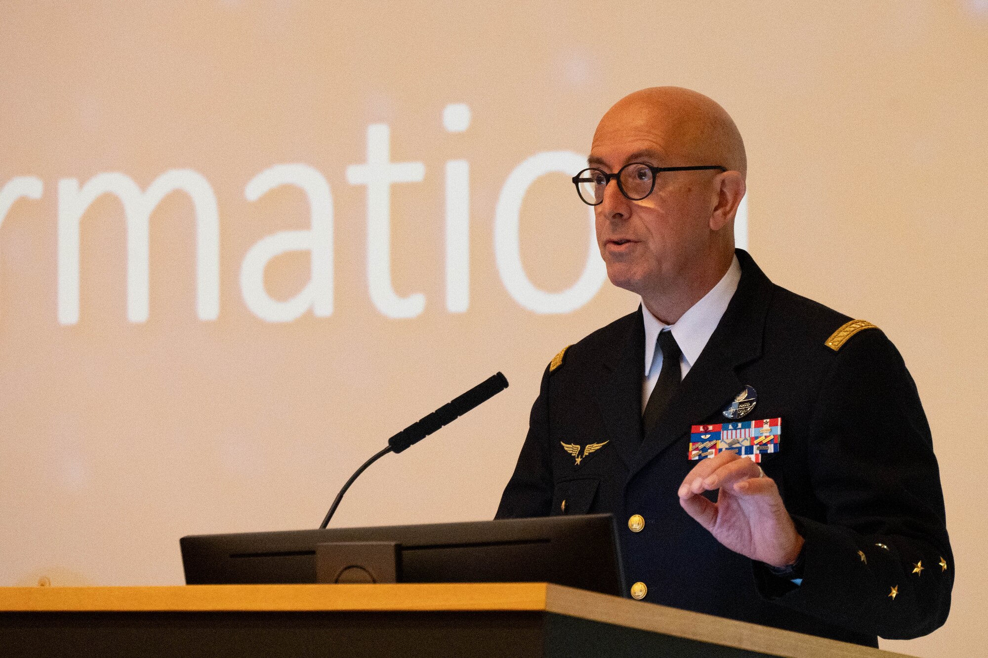 A presenter gives a speech.