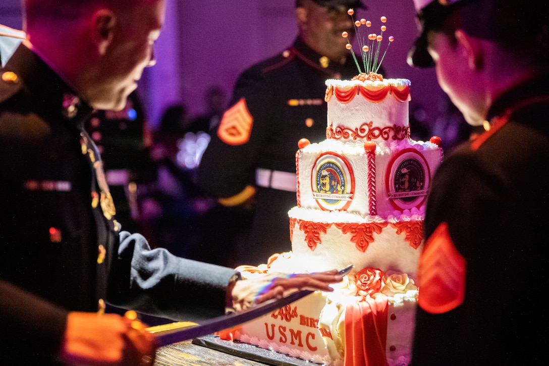 U.S. Marine Corps Maj. Ryan Rullman, the commanding officer of Recruiting Station Raleigh, cuts the ceremonial cake during the 248th Marine Corps Birthday Ceremony in Greenville, North Carolina Oct. 28, 2023. Marine Corps units hold birthday celebrations every year to reflect on the traditions, history and legacy of the Marine Corps. (U.S. Marine Corps Photo by Sgt. Brandon Salas)