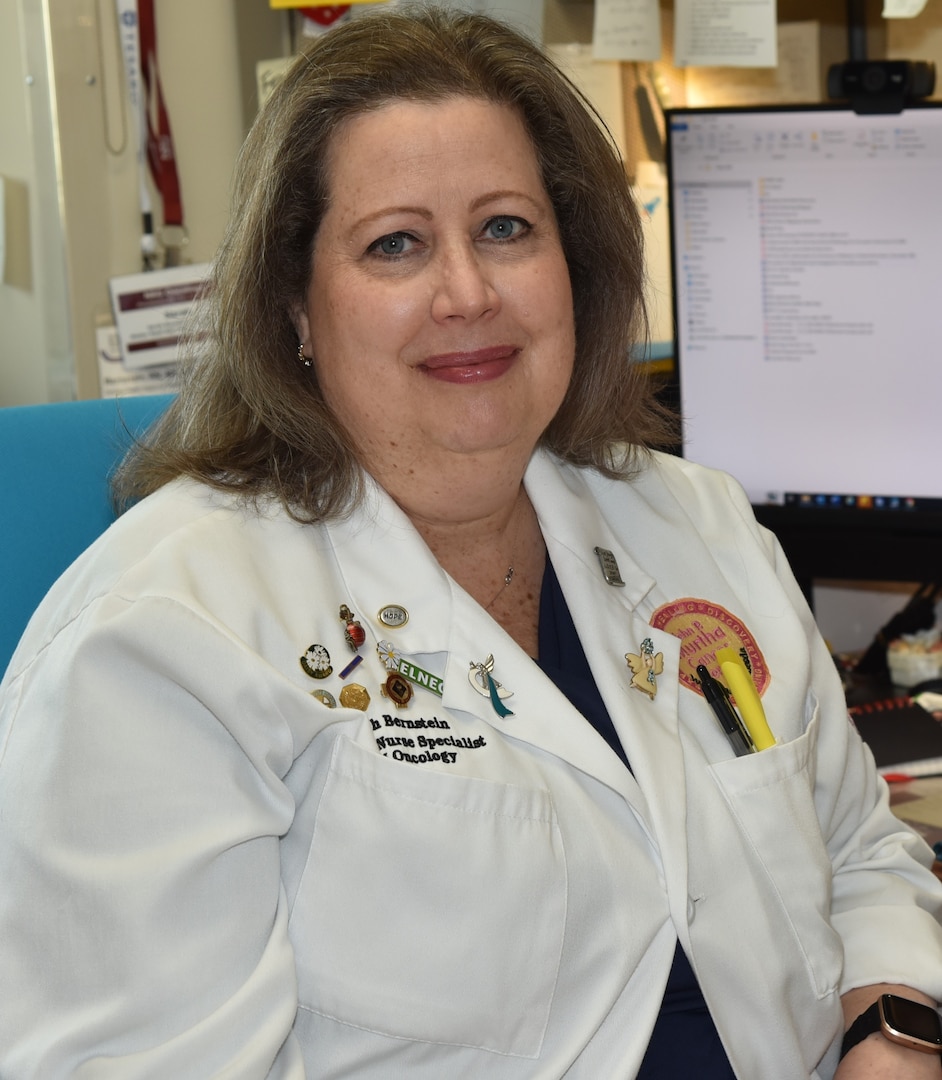 Sarah Bernstein, RN, MS, AOCN, stands as a beacon of unwavering dedication and compassionate care for her patients at Walter Reed National Military Medical Center.