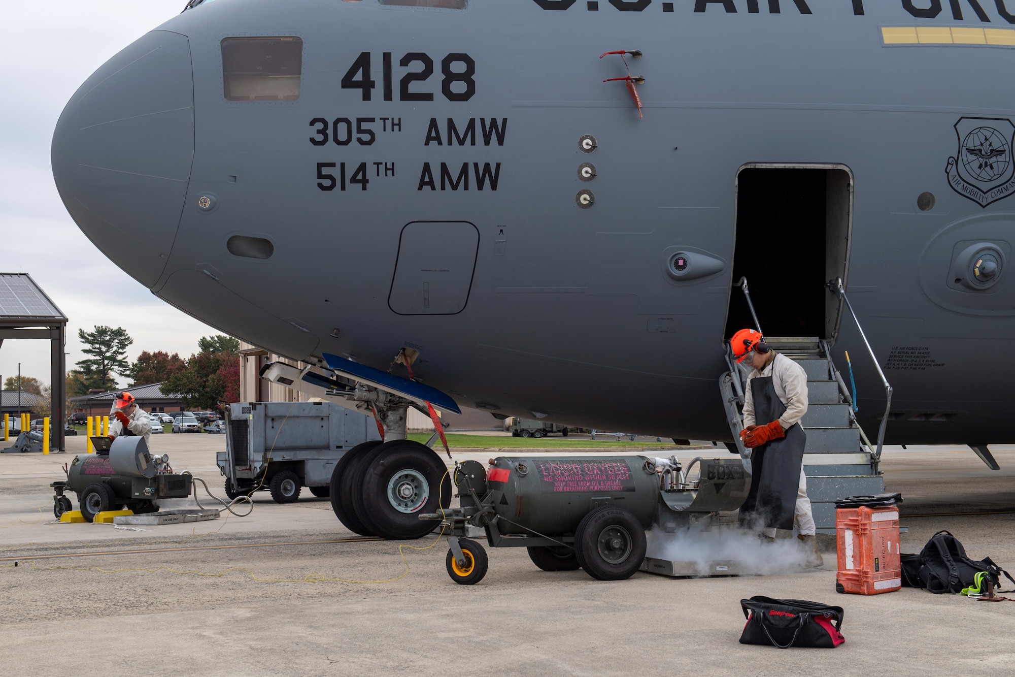 Reserve Citizen Airmen from the 514th Aircraft Maintenance Squadron, 514th Air Mobility Wing, conduct routine maintenance on a C-17 Globemaster III at Joint Base McGuire-Dix-Lakehurst, N.J., on Nov. 4, 2023.