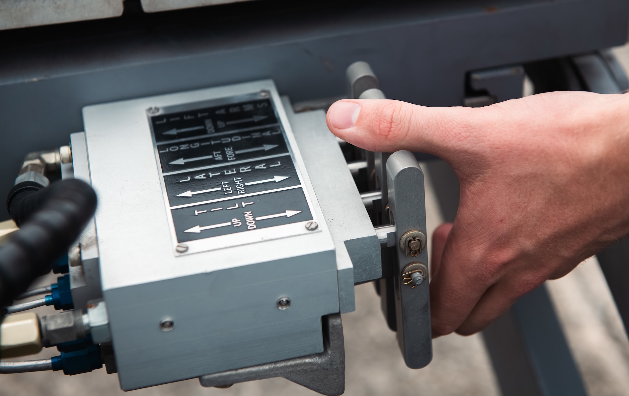 Airman trains on using bomb loading cart.