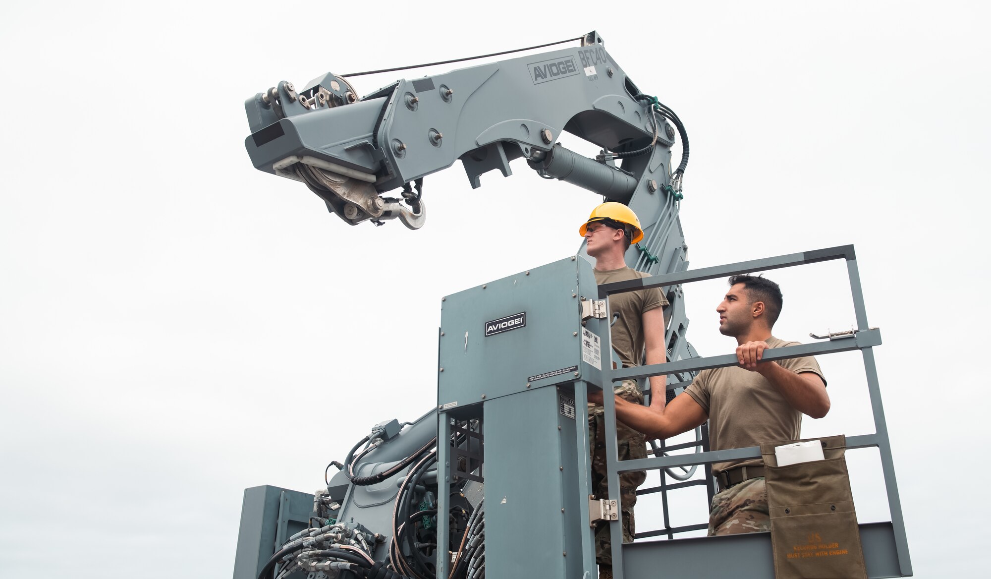 Airmen train on using a crane.