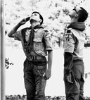 Members of Riverton (Illinois) Scout Troop #46 salute after posting the American Flag during the ceremony.