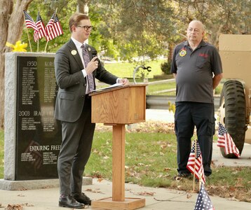 Parker Staab of Staab Funeral Home in Springfield, Illinois, speaks during the Clear Lakes Township ceremony.