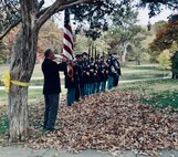 The Reverend John Keyes plays Taps in front of the 114th Regiment, Illinois Volunteer Infantry, Reactivated.