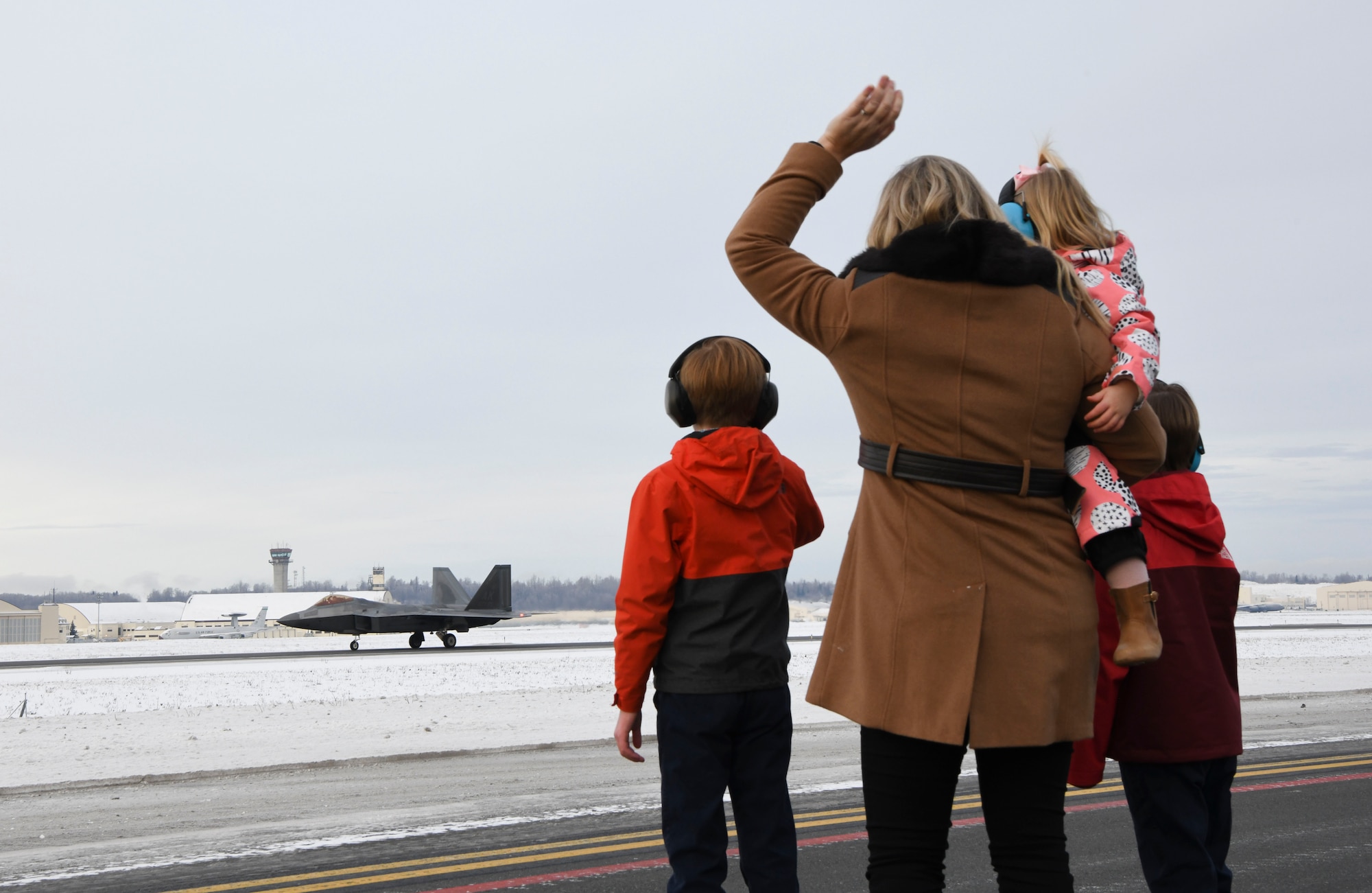 Lt. Col. John Deloney, 302nd Fighter Squadron F-22 Raptor pilot instructor, flys his fini flight Dec. 3, 2022, Joint Base Elmendorf Richardson, Alaska. Deloney accomplished over 2200 flying hours during his service.