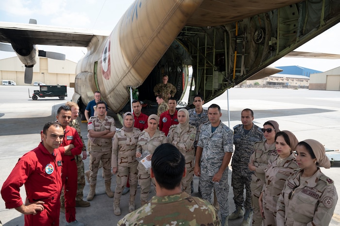 U.S. Air Force Staff Sgt. Haydon Korob, 60th Aeromedical Evacuation (AE) Squadron AE technician paramedic, instructs Egyptian Armed Forces service members during exercise Bright Star 23 at Cairo East Air Base, Egypt, Sept. 13, 2023. Bright Star 2023 is a multilateral U.S. Central Command exercise held with the Arab Republic of Egypt across air, land and sea domains that promotes and enhances regional security and cooperation while improving interoperability in irregular warfare against hybrid threat scenarios. (U.S. Air Force photo by Senior Airman Jacob Cabanero)