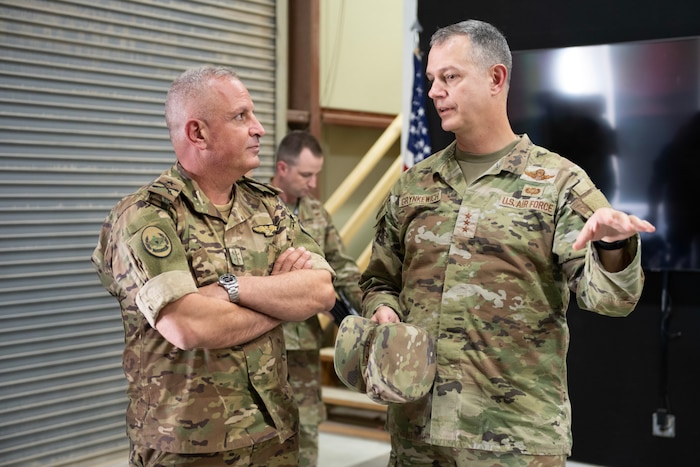 U.S. Air Force Lt. Gen. Alexus Grynkewich, Ninth Air Force (Air Forces Central) commander, and Combined Forces Air Component Commander for U.S. Central Command, right, and Lebanese Armed Forces Brig. Gen. Michel Assad Al-Saifi, Air Force commander, tour the Task Force 99 facility during a visit Sept. 22, 2023, at Al Udeid Air Base, Qatar. The visit allowed the leaders to discuss opportunities for improving interoperability and strengthening the partnership between the two forces, as well as learn about the TF-99 mission and capabilities. (U.S. Air Force photo by Staff Sgt. Jennifer Zima)