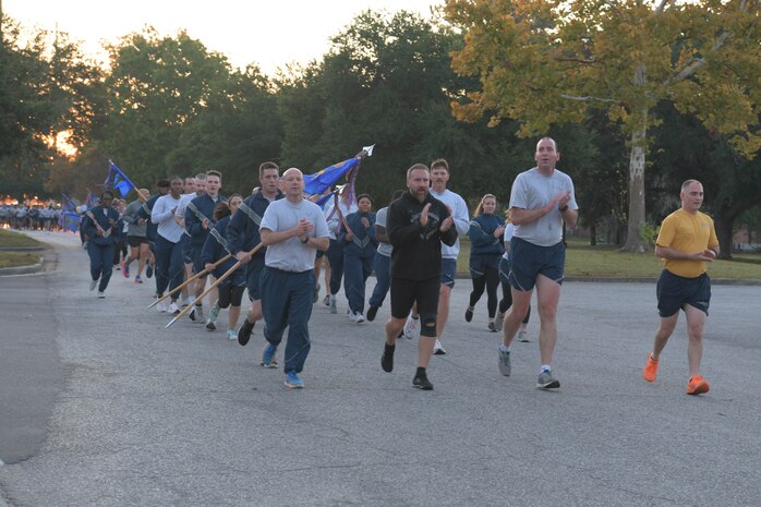 The Joint Base Charleston leadership team leads the 628th Air Base Wing in a formation run on JB Charleston, Oct. 20, 2023.