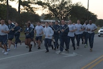 Airmen from the 628th Air Base Wing participate in a formation run on Joint Base Charleston, South Carolina, Oct. 20, 2023.