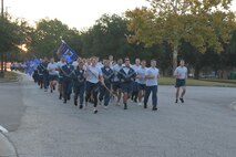 Airmen from the 628th Air Base Wing participate in a formation run on Joint Base Charleston, South Carolina, Oct. 20, 2023.