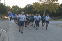 Airmen from the 628th Air Base Wing participate in a formation run on Joint Base Charleston, South Carolina, Oct. 20, 2023.