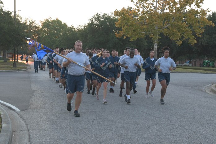 Airmen from the 628th Air Base Wing participate in a formation run on Joint Base Charleston, South Carolina, Oct. 20, 2023.