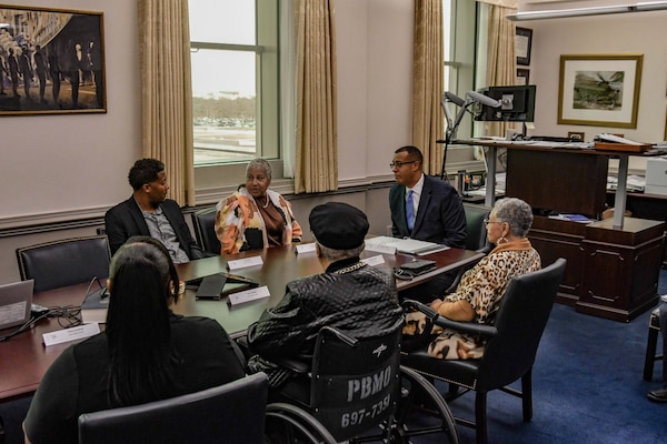 Mr. Franklin Parker, Assistant Secretary of the Navy for Manpower and Reserve Affairs (ASN M&RA), right, met with descendants of Mr. Otto Robinson and Mr. Jesse Watford, members of the 'Philadelphia 15', at the Pentagon on Nov. 6, 2023.