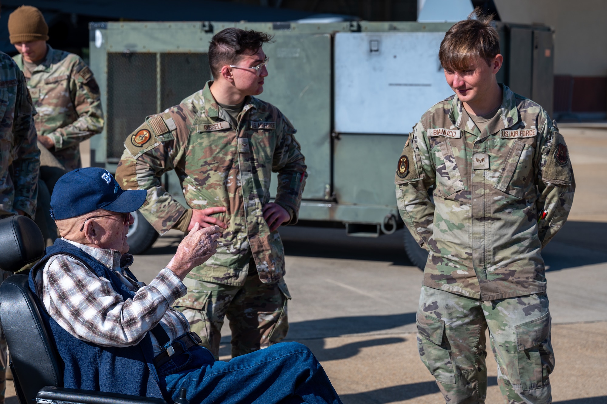 Senior Airman Ethan Bianucci, 2nd Maintenance Squadron aerospace ground equipment specialist, talks with retired Senior Master Sgt. John McNeece at Barksdale Air Force Base, La., October 18, 2023. McNeece was among the first generation of B-52 maintainers during his time in service from 1952 until 1975. (U.S. Air Force photo by Airman 1st Class Seth Watson)