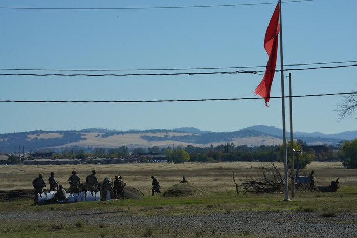 Airmen from the 9th Reconnaissance Wing fill sandbags to build a defensive fighting position (DFP) during the Multi-Capable Airmen Tier-1 course Oct. 27, 2023, at Beale Air Force Base, California.