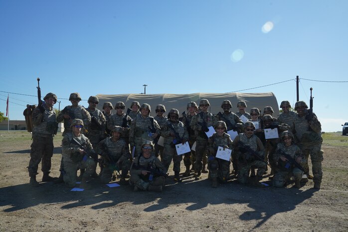 Airmen from the 9th Reconnaissance Wing pose for a group photo after the Multi-Capable Airmen Tier-1 course Oct. 27, 2023, at Beale Air Force Base, California.