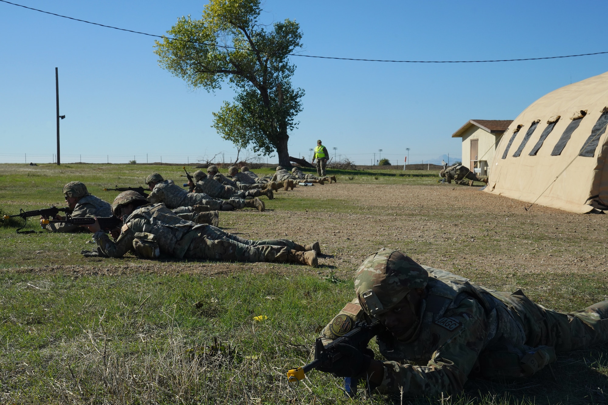 Airmen from the 9th Reconnaissance Wing position themselves to defend the small shelter system (SSS) during the Multi-Capable Airmen Tier-1 course Oct. 27, 2023, at Beale Air Force Base, California.