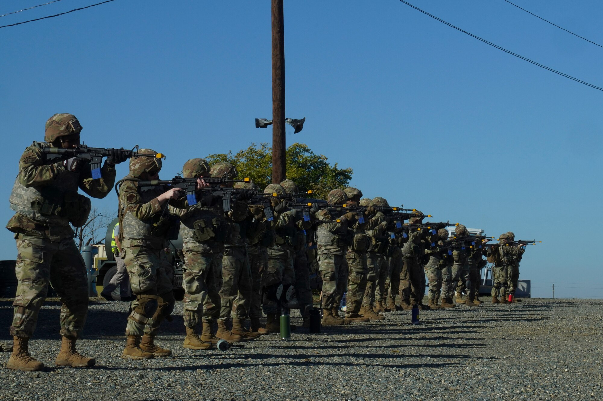 Airmen from the 9th Reconnaissance Wing practice firing the M4 during the Multi-Capable Airmen Tier-1 course Oct. 27, 2023, at Beale Air Force Base, California.