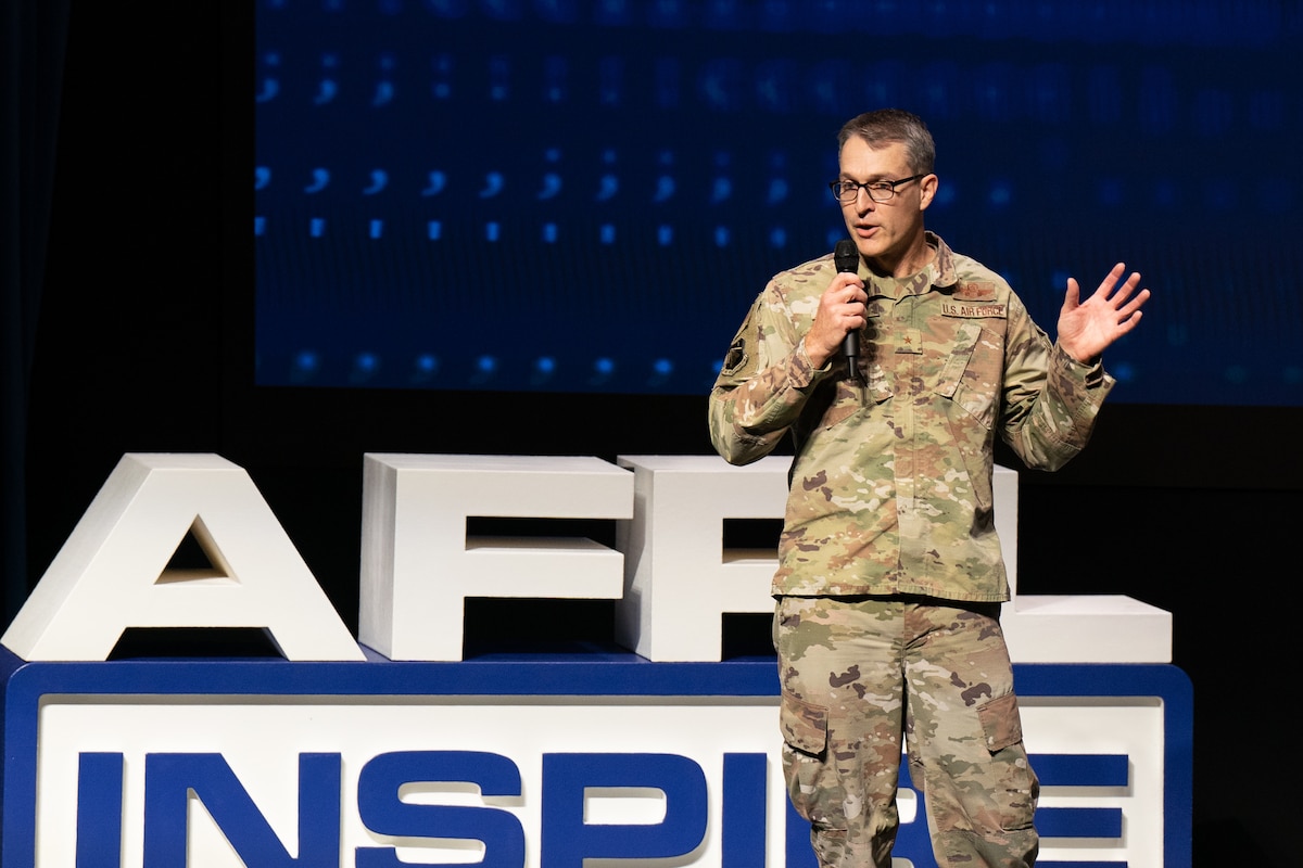Air Force Research Laboratory, or AFRL, Commander Brig. Gen Scott Cain delivers closing remarks to the audience at AFRL’s Inspire event at the Air Force Institute of Technology’s Kenney Hall, Oct. 26, 2023. “I want to give a very special thanks to our speakers today,” Cain said. “I give them those thanks because they had the courage to take on tough problems and the courage to get on this stage. Your guts are inspiring.” The day’s program provided a glimpse into the people of AFRL, Cain said, and “the fire in all of them.” (U.S. Air Force photo / Cherie Cullen)