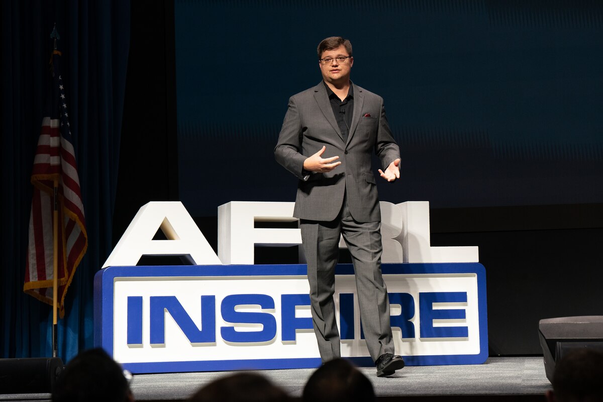 Dr. Richard Beblo, a mechanical engineer in the Air Force Research Laboratory, or AFRL’s, Aerospace Systems Directorate, delivers his talk “Groundbreaking Innovation at the Speed of Failure” at the seventh annual AFRL Inspire event at the Air Force Institute of Technology’s Kenney Hall, Oct. 26, 2023. Beblo opened his talk by recounting a time when he and his research team conducted a sled test — a type of nondestructive experiment that reproduces the dynamic conditions of a full-scale crash scenario — that “failed” spectacularly. While others present at the testing site deemed the test a total flop, Beblo said, he and his team were ecstatic about their supposed failure. “We were excited because we knew the test just gained value,” Beblo said. “We knew we were about to learn things that we hadn’t even anticipated as things we needed to learn.” The quickest path to success is to fail fast and fail often, Beblo said, and this perspective applies to the development of new technologies. (U.S. Air Force photo / Cherie Cullen)