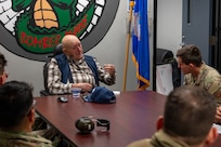 Retired Senior Master Sgt. John McNeece shares stories and advice with 2nd Maintenance Squadron maintainers at Barksdale Air Force Base, La., October 18, 2023. McNeece was among the first generation of B-52H Stratofortress maintainers during his time in service from 1952 until 1975. (U.S. Air Force photo by Airman 1st Class Seth Watson)