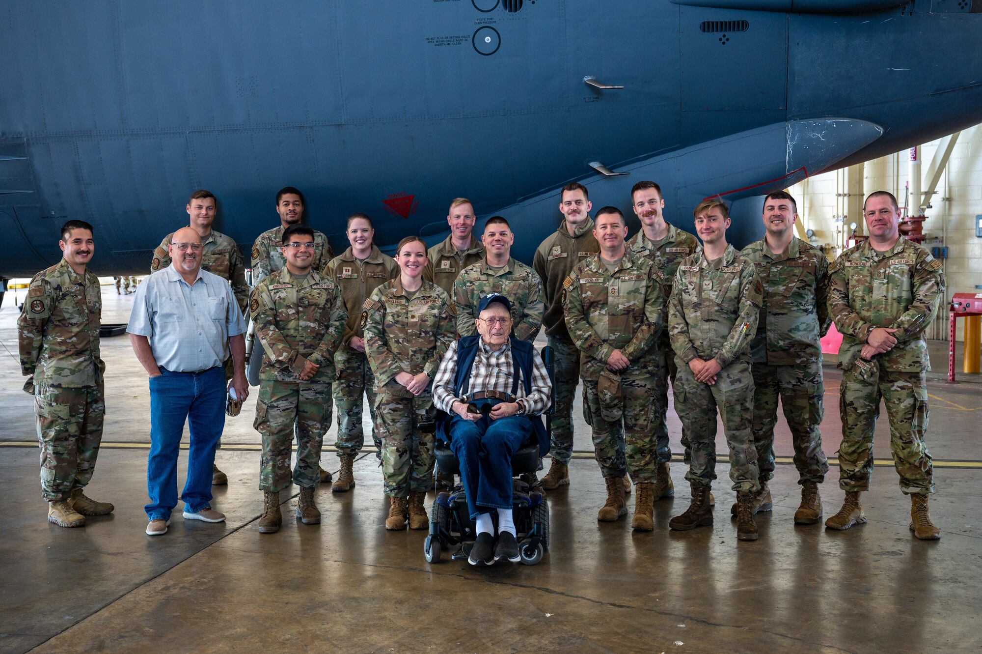 2nd Maintenance Squadron maintainers pose for a photo with retired Senior Master Sgt. John McNeece at Barksdale Air Force Base, La., October 18, 2023. McNeece served in the U.S. Air Force from 1952 to 1975 and worked as a maintainer when the B-52 was first introduced. (U.S. Air Force photo by Airman 1st Class Seth Watson)