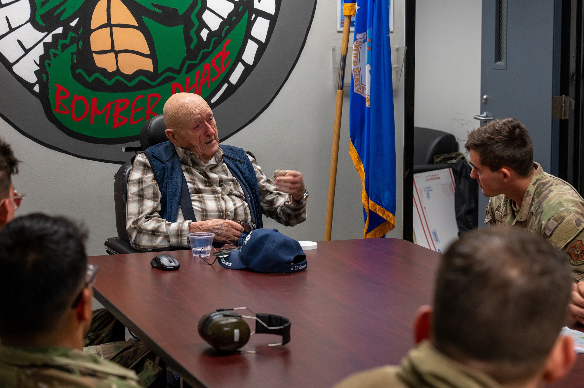 Retired Senior Master Sgt. John McNeece shares stories and advice with 2nd Maintenance Squadron maintainers at Barksdale Air Force Base, La., October 18, 2023. McNeece was among the first generation of B-52H Stratofortress maintainers during his time in service from 1952 until 1975. (U.S. Air Force photo by Airman 1st Class Seth Watson)