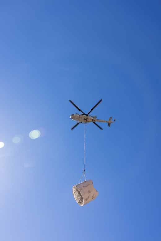 A U.S. Marine Corps UH-1Y Venom with Marine Light Helicopter Attack Training Squadron (HMLAT) 303, Marine Aircraft Group 39, 3rd Marine Aircraft Wing, removes an aging water guzzler from Harper Canyon located in Anza-Borrego Desert State Park, California, Nov. 5, 2023