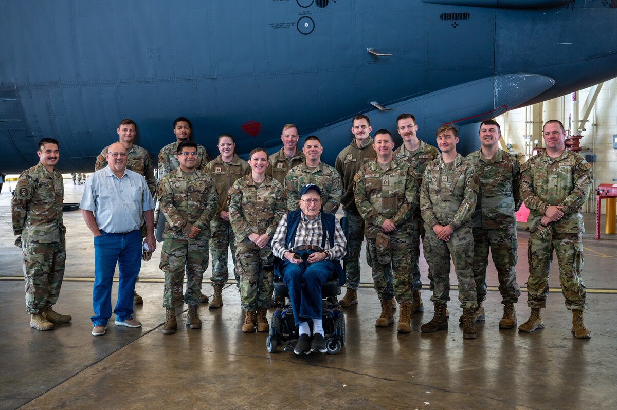 2nd Maintenance Squadron maintainers pose for a photo with retired Senior Master Sgt. John McNeece at Barksdale Air Force Base, La., October 18, 2023. McNeece served in the U.S. Air Force from 1952 to 1975 and worked as a maintainer when the B-52 was first introduced. (U.S. Air Force photo by Airman 1st Class Seth Watson)