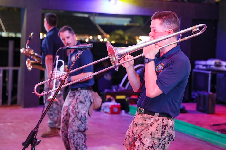 U.S. Navy Musician 3rd Class Aaron Wright, from Traverse City, Michigan, performs during a U.S. Navy Pacific Fleet and Royal Australian Navy Band concert at a night market in Majuro, Republic of the Marshall Islands, during Pacific Partnership 2024-1 Nov. 4, 2023. Now in its 19th iteration, Pacific Partnership is the largest annual multinational humanitarian assistance and disaster relief preparedness mission conducted in the Indo-Pacific. (U.S. Navy photo by Mass Communication Specialist 1st Class Jacob I. Allison)