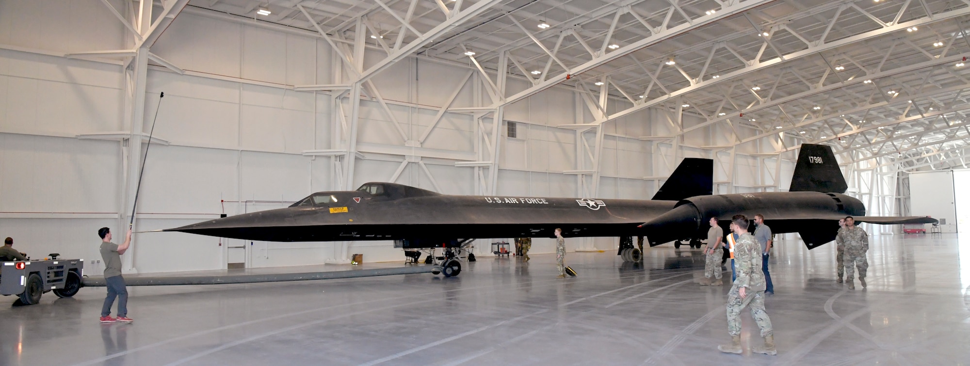 Crews relocate an SR-71 Blackbird static display inside the Hill Aerospace Museum’s new L.S. Skaggs Gallery Oct. 23, 2023, at Hill Air Force Base, Utah. Last month, a significant portion of the museum’s aircraft collection was moved into the new gallery by museum staff and volunteers from organizations outside the museum. (U.S. Air Force photo by Todd Cromar)