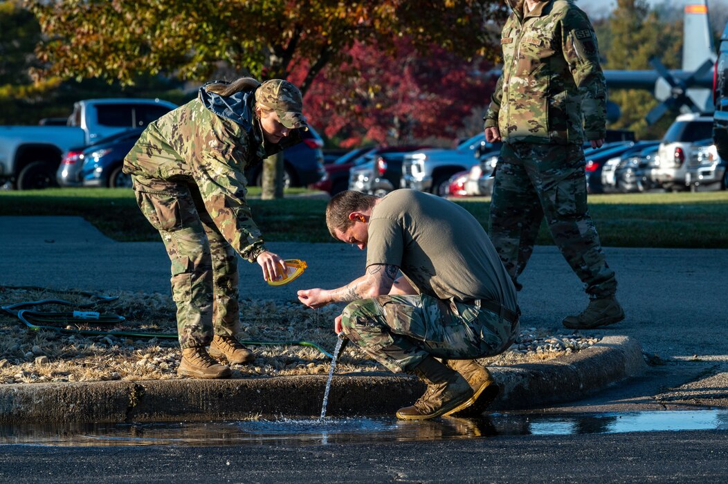 Airmen doing pepper spray training.