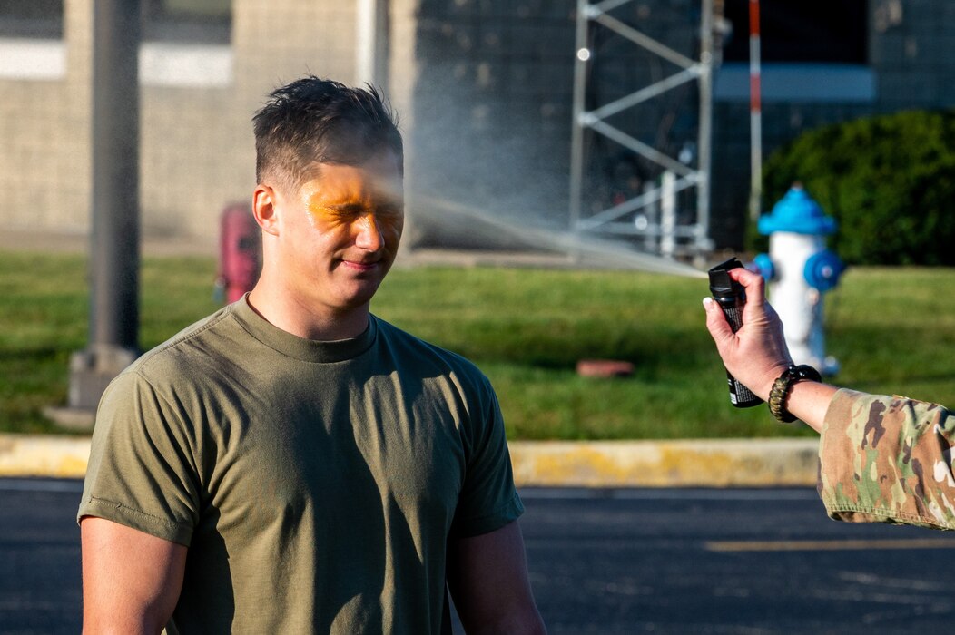 Airmen doing pepper spray training.