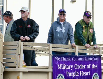 Purple Heart recipients ride in the Quincy (Illinois) Veterans Day Parade on Nov. 4.